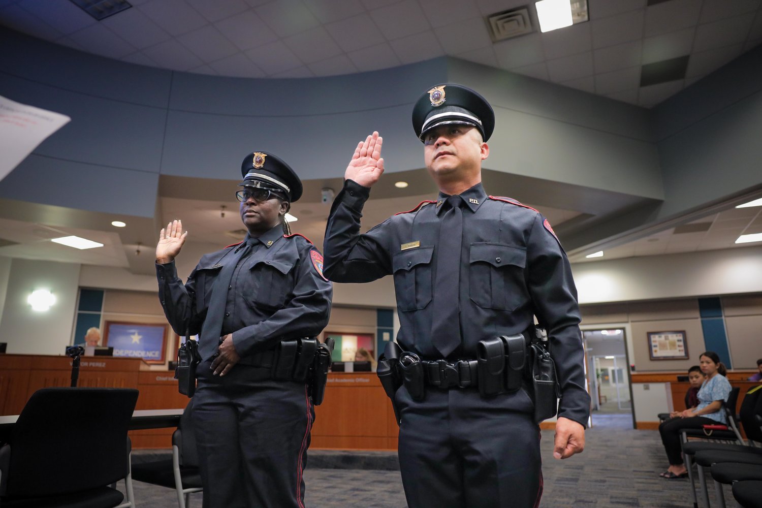 wo new Katy ISD police officers, Doreen E. Duclair, left, and Vinh Q. Pham, took their oaths of office at Monday’s trustees meeting.
